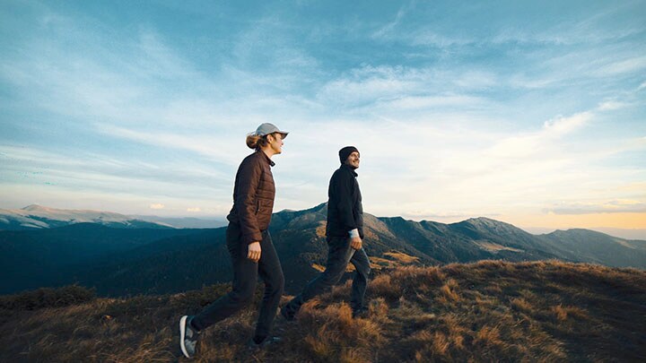 Couple walking in the mountains